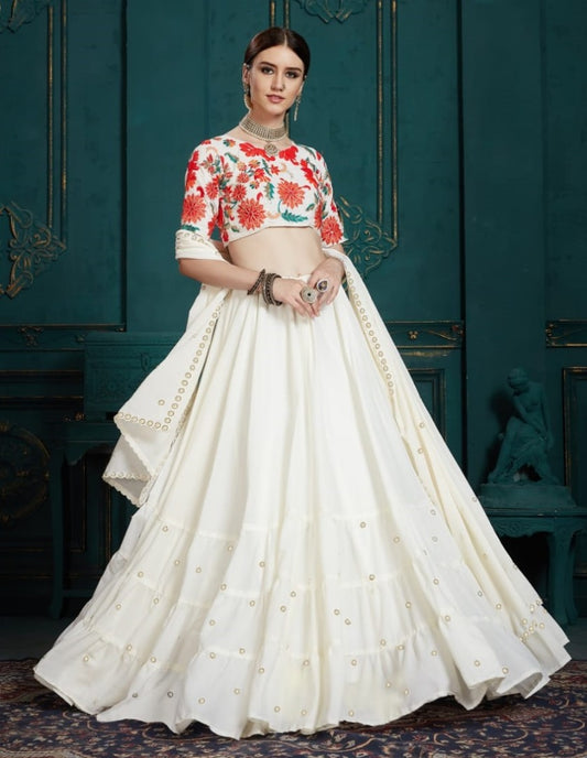 White georgette ruffle lehenga with embroidered blouse