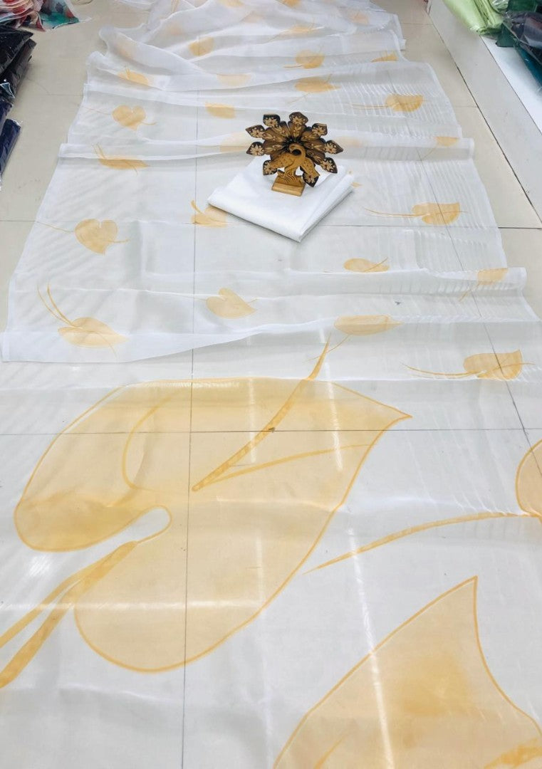White organza yellow leaf printed saree