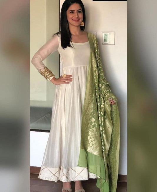 White silk plain anarkali suit with printed green dupatta