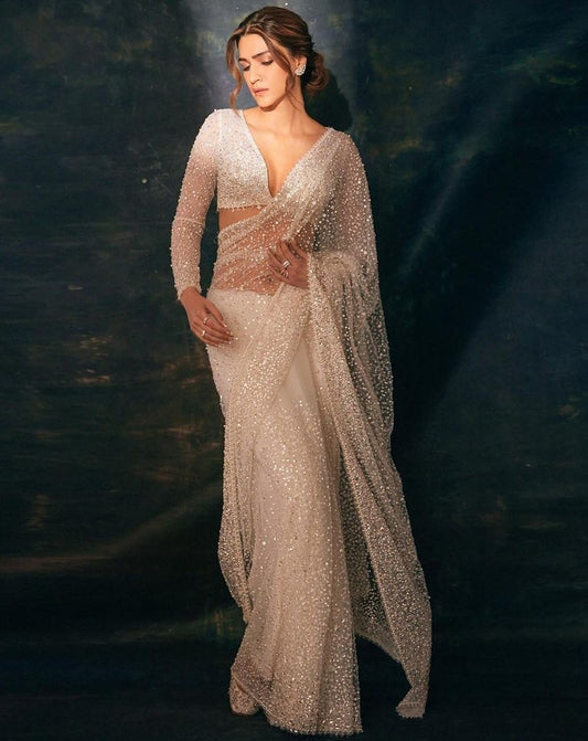 White soft net heavy sequence and pearl work shiny kriti sanon designer saree