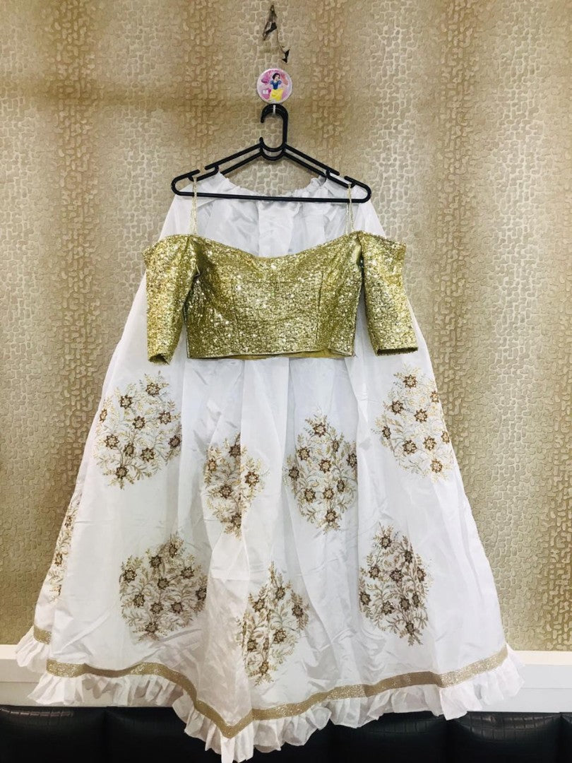 white tapeta silk beautiful ceremonial lehenga choli