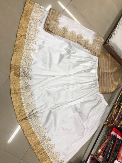 white tapeta silk bollywood style ceremonial lehenga