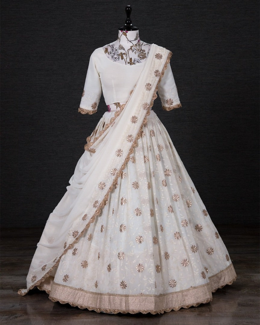 White thread embroidered lehenga choli