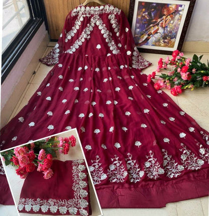 Wine heavy georgette zari embroidered work party wear gown