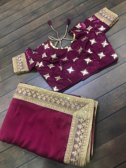 Wine heavy rangoli silk embroidered wedding saree