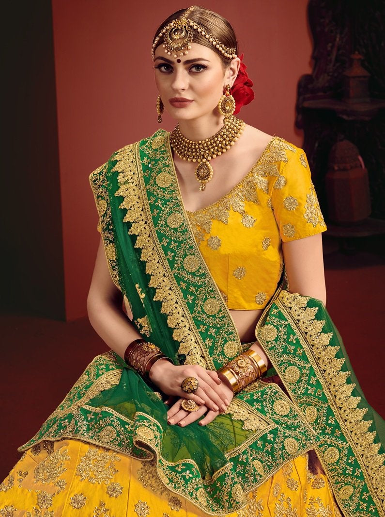 Yellow and green heavy designer embroidered bridal lehenga choli