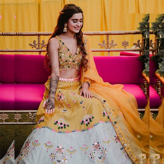 Yellow and white mehndi rasam lehenga choli