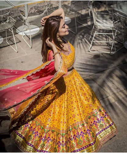 Yellow banglory satin digital printed festival wear lehenga choli