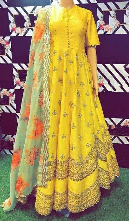 Yellow banglory satin embroidered long gown with dupatta