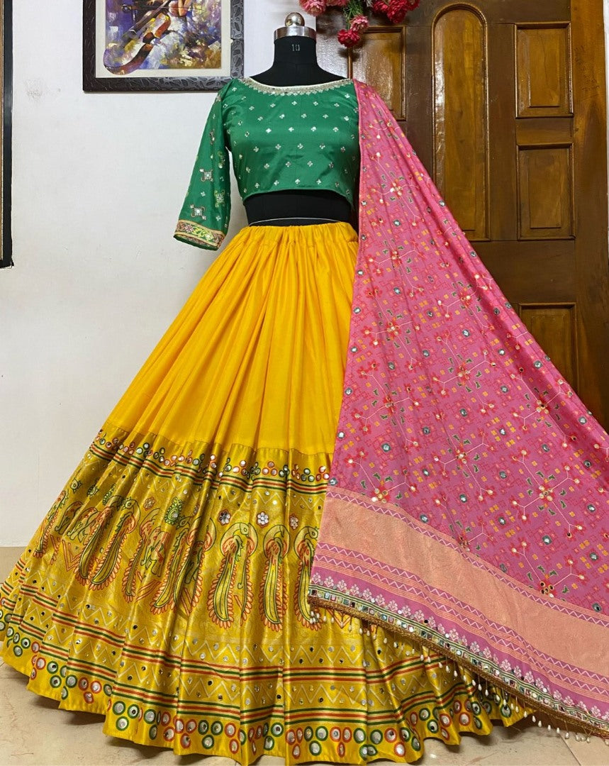 Yellow butter silk printed and mirror work lehenga choli