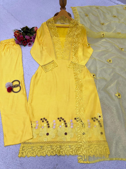 Yellow ceremonial salwar suit with organza dupatta