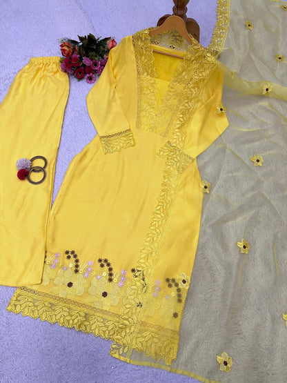 Yellow ceremonial salwar suit with organza dupatta