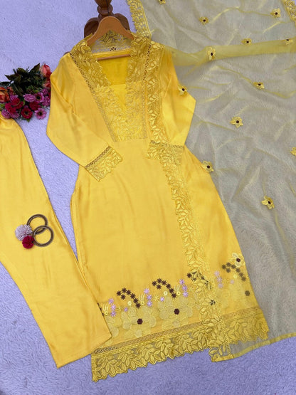 Yellow ceremonial salwar suit with organza dupatta