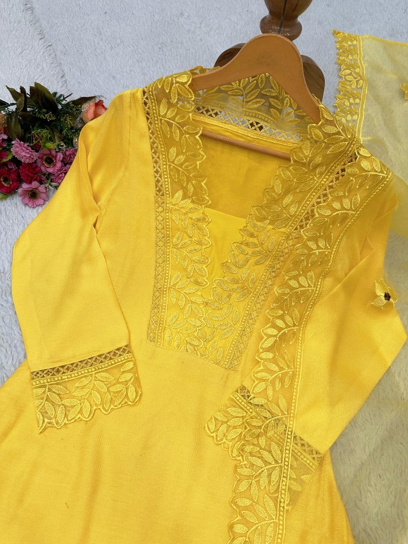 Yellow ceremonial salwar suit with organza dupatta