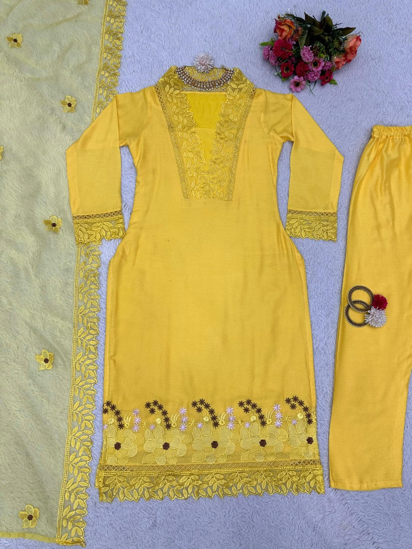 Yellow ceremonial salwar suit with organza dupatta