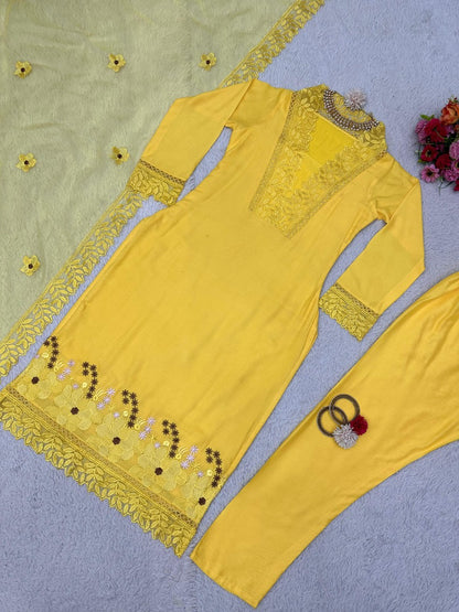 Yellow ceremonial salwar suit with organza dupatta