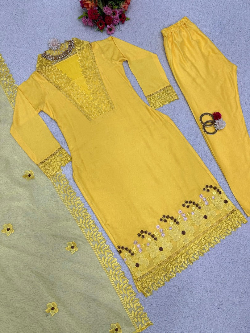 Yellow ceremonial salwar suit with organza dupatta