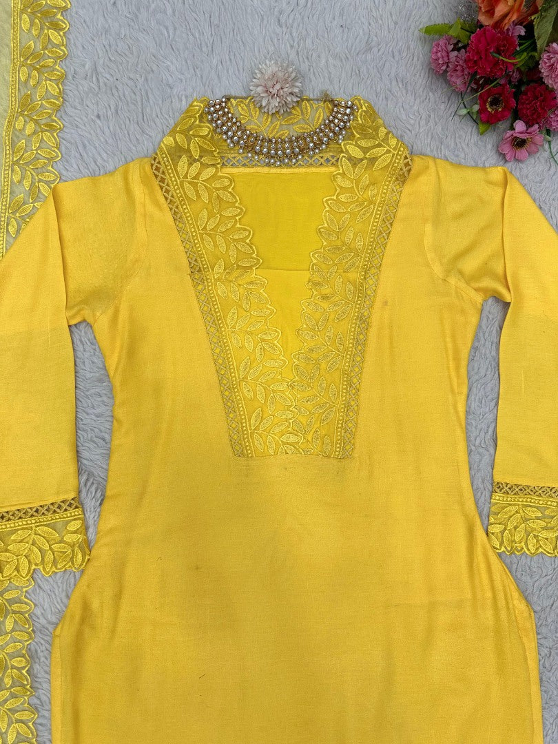 Yellow ceremonial salwar suit with organza dupatta