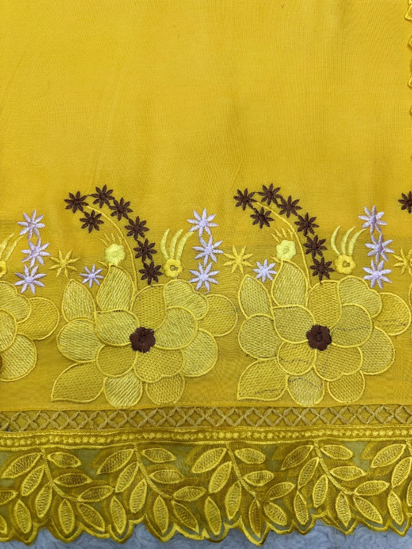 Yellow ceremonial salwar suit with organza dupatta