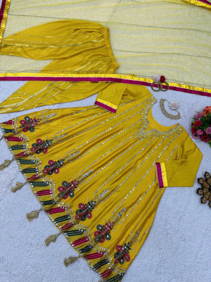 Yellow chinon silk heavy work dhoti suit