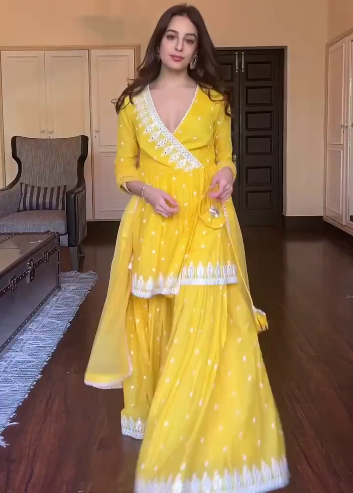 Yellow embroidery work sharara suit