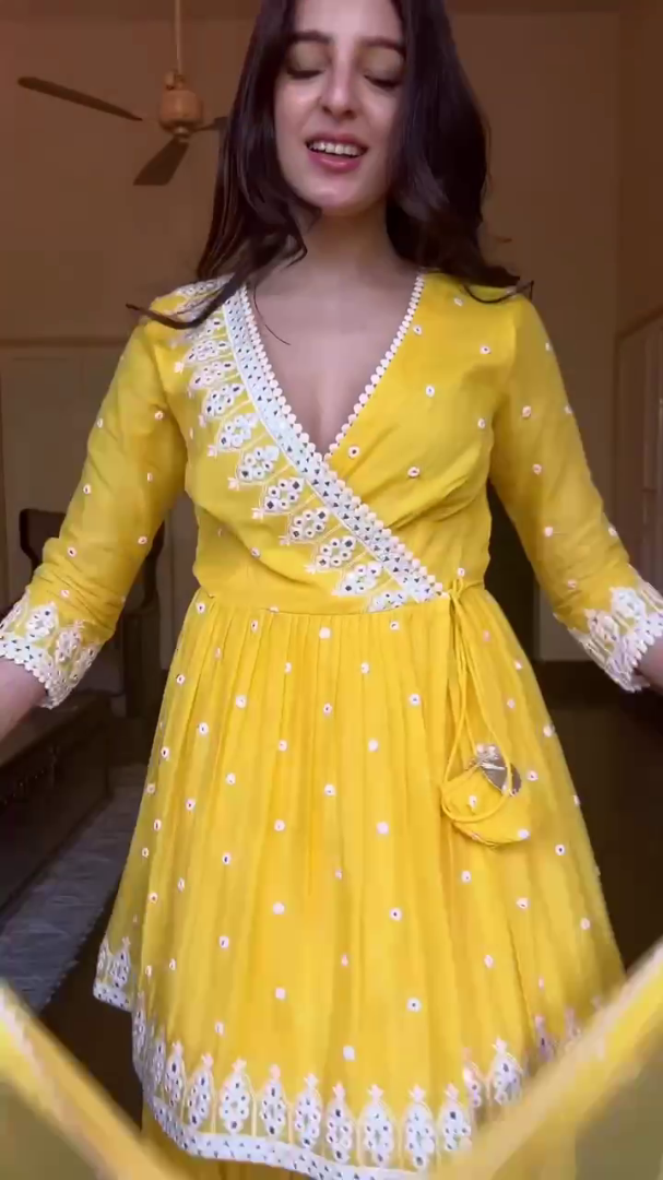 Yellow embroidery work sharara suit