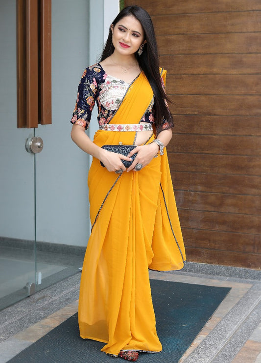 Yellow georgette designer saree with stitched blouse