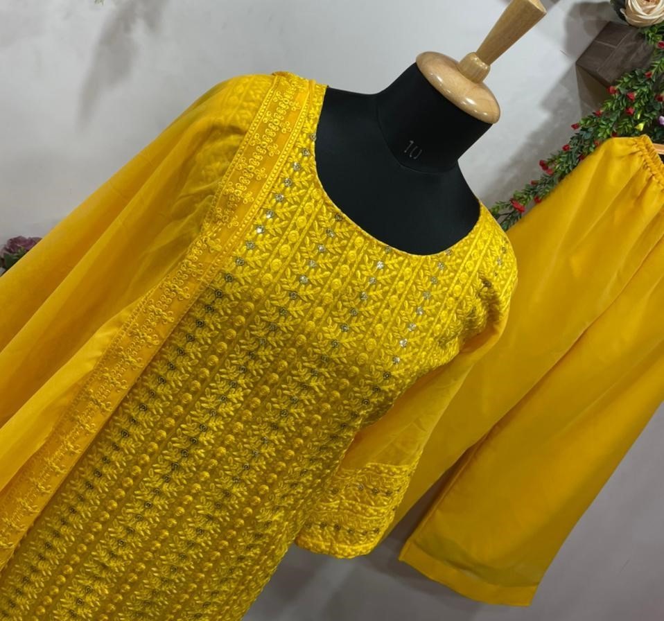 Yellow georgette embroidered sequence work plazzo suit