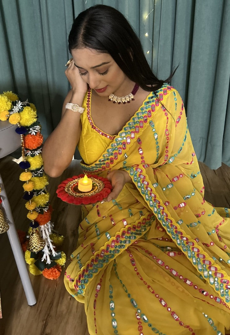 Yellow georgette heavy work festive ceremonial saree