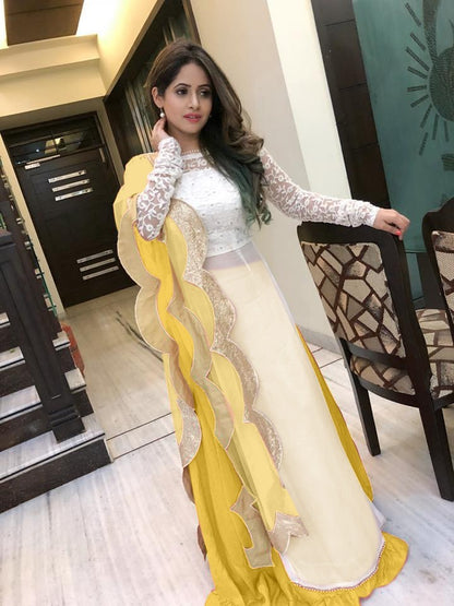 Yellow georgette lehenga with white long top lehenga suit