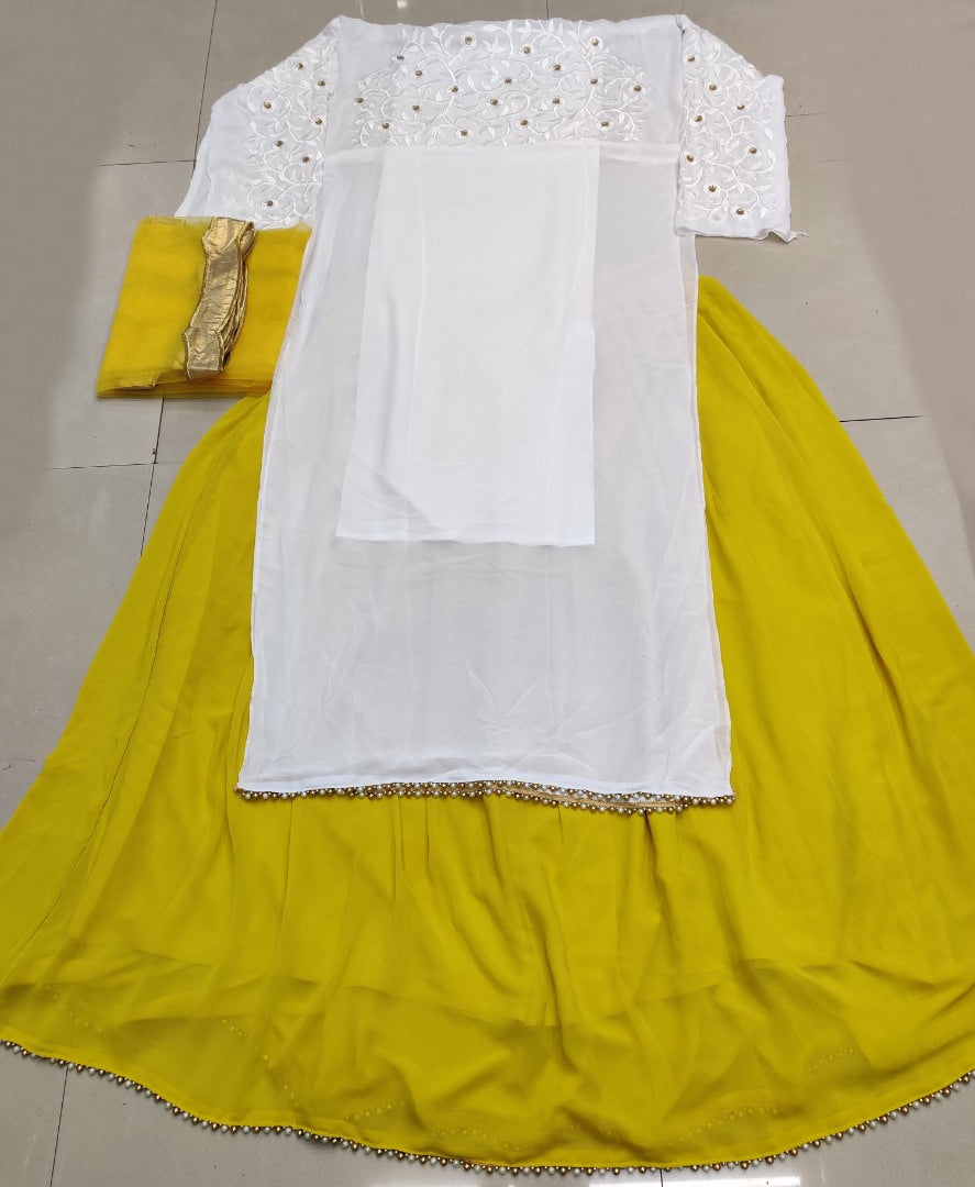 Yellow georgette lehenga with white long top lehenga suit