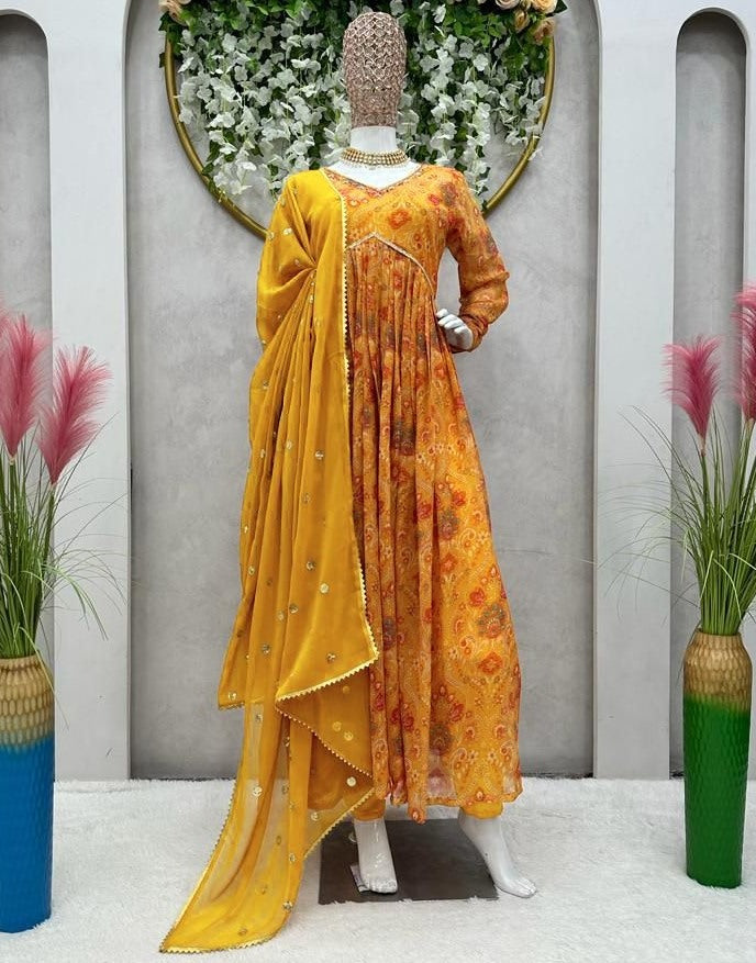 Yellow georgette print and hand worked alia cut kurti