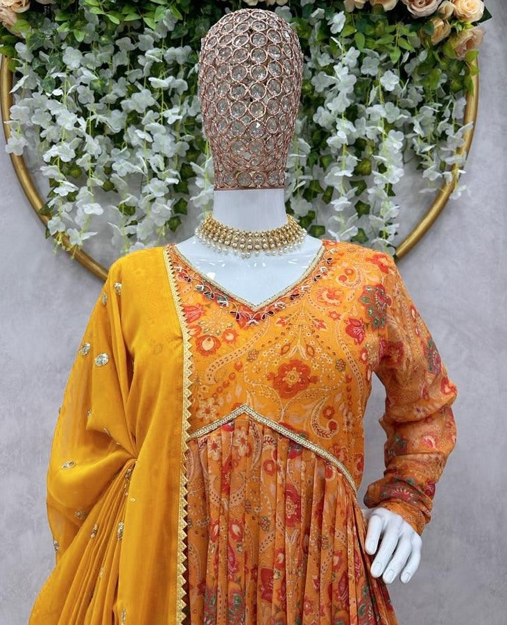 Yellow georgette print and hand worked alia cut kurti