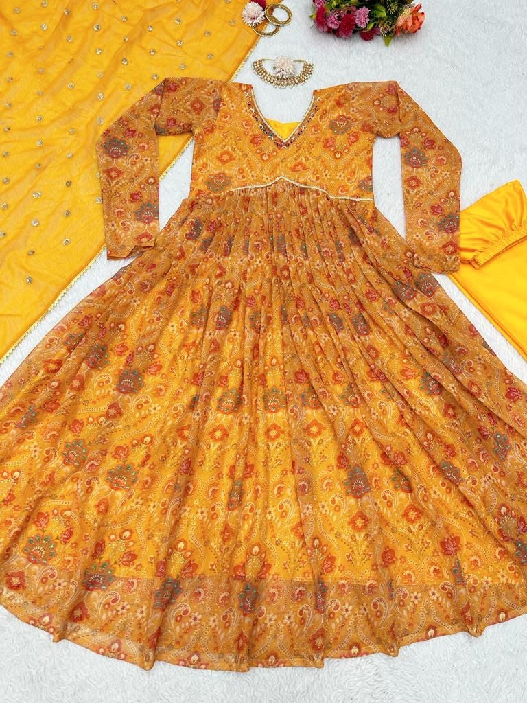 Yellow georgette print and hand worked alia cut kurti