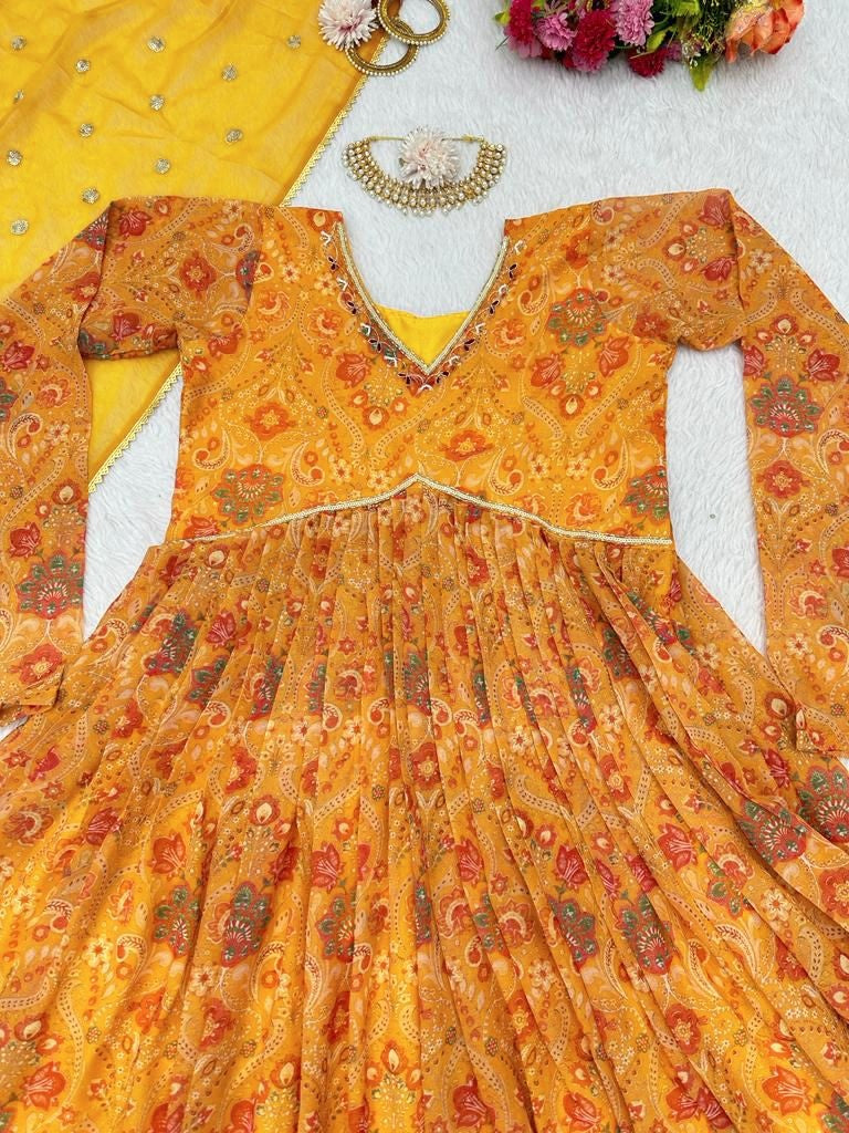 Yellow georgette print and hand worked alia cut kurti