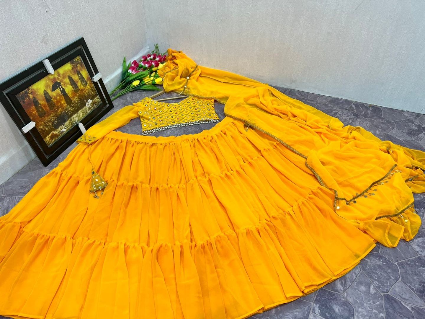 Yellow georgette ruffle lehenga choli for haldi ceremony