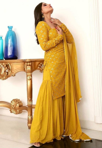 Yellow georgette thread and paper mirror work sharara suit