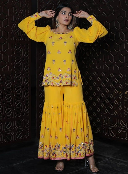 Yellow georgette thread and sequence work ceremonial sharara suit