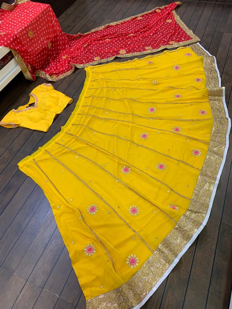 Yellow georgette zari and thread embroidered lehenga choli