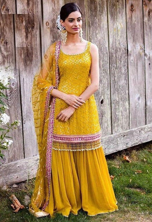 Yellow heavy georgette embroidered designer sharara salwar suit