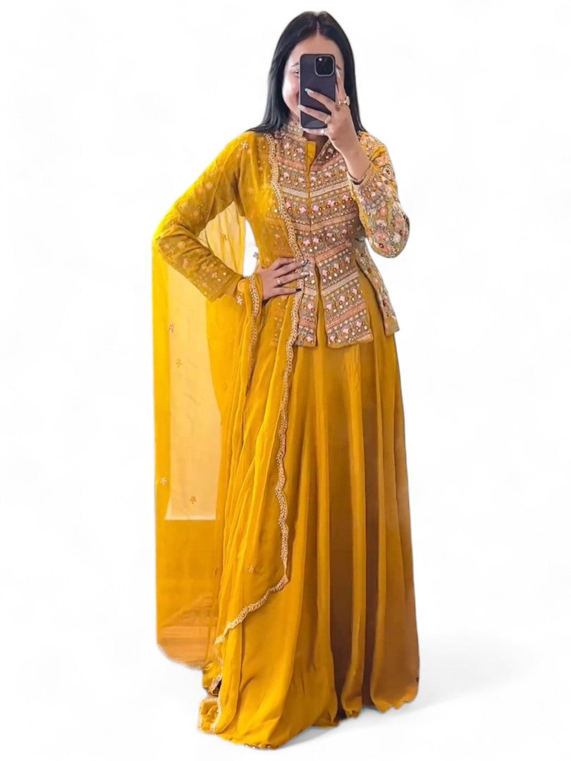 Yellow lehenga with long heavy work choli