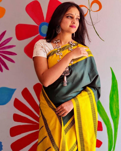 Yellow lichi silk jacquard weaving work saree