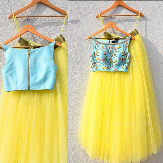 yellow net festival wear crop top lehenga with embroidered blouse