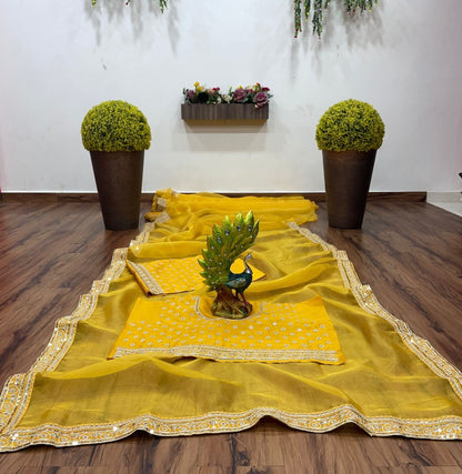 Yellow organza coading and sequence work wedding saree