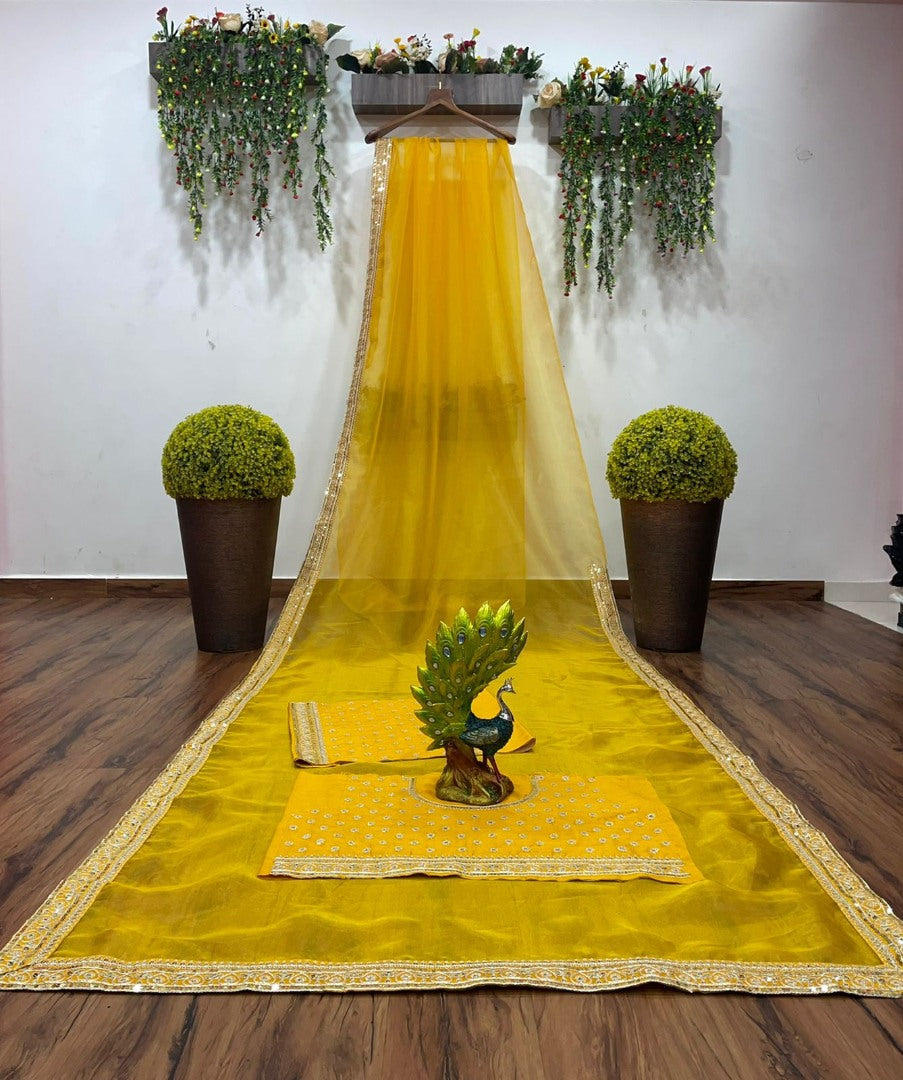 Yellow organza coading and sequence work wedding saree