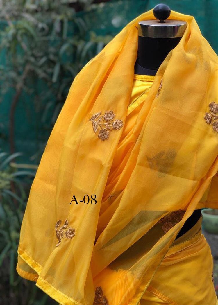 Yellow organza embroidered festival wear saree