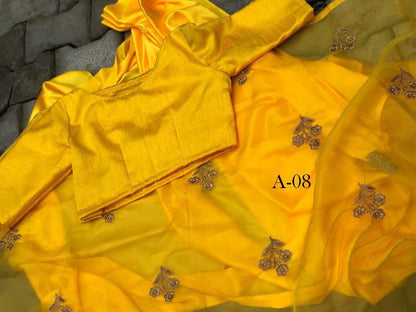 Yellow organza embroidered festival wear saree