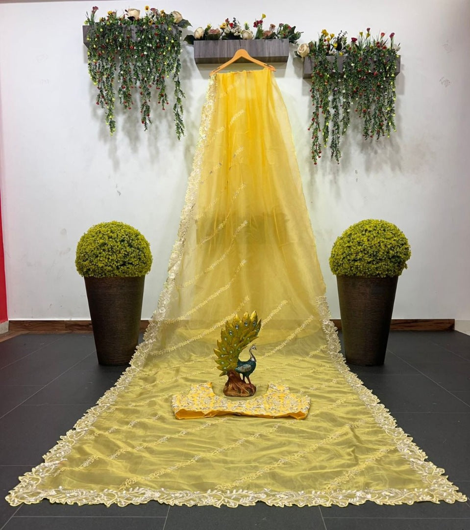 Yellow organza theread embroidered saree