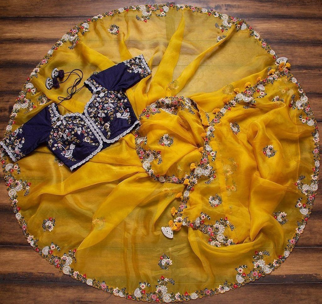 Yellow organza with sequence embroidered work saree