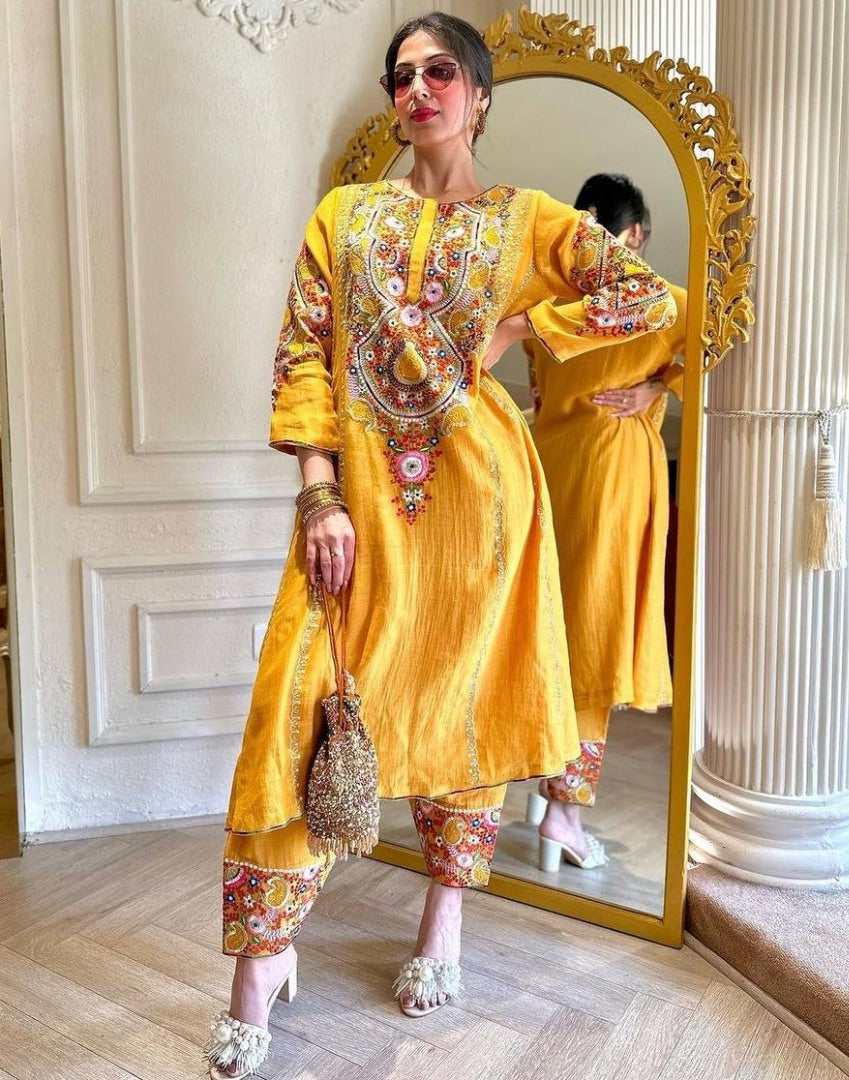 Yellow rayon embroidery work kurti